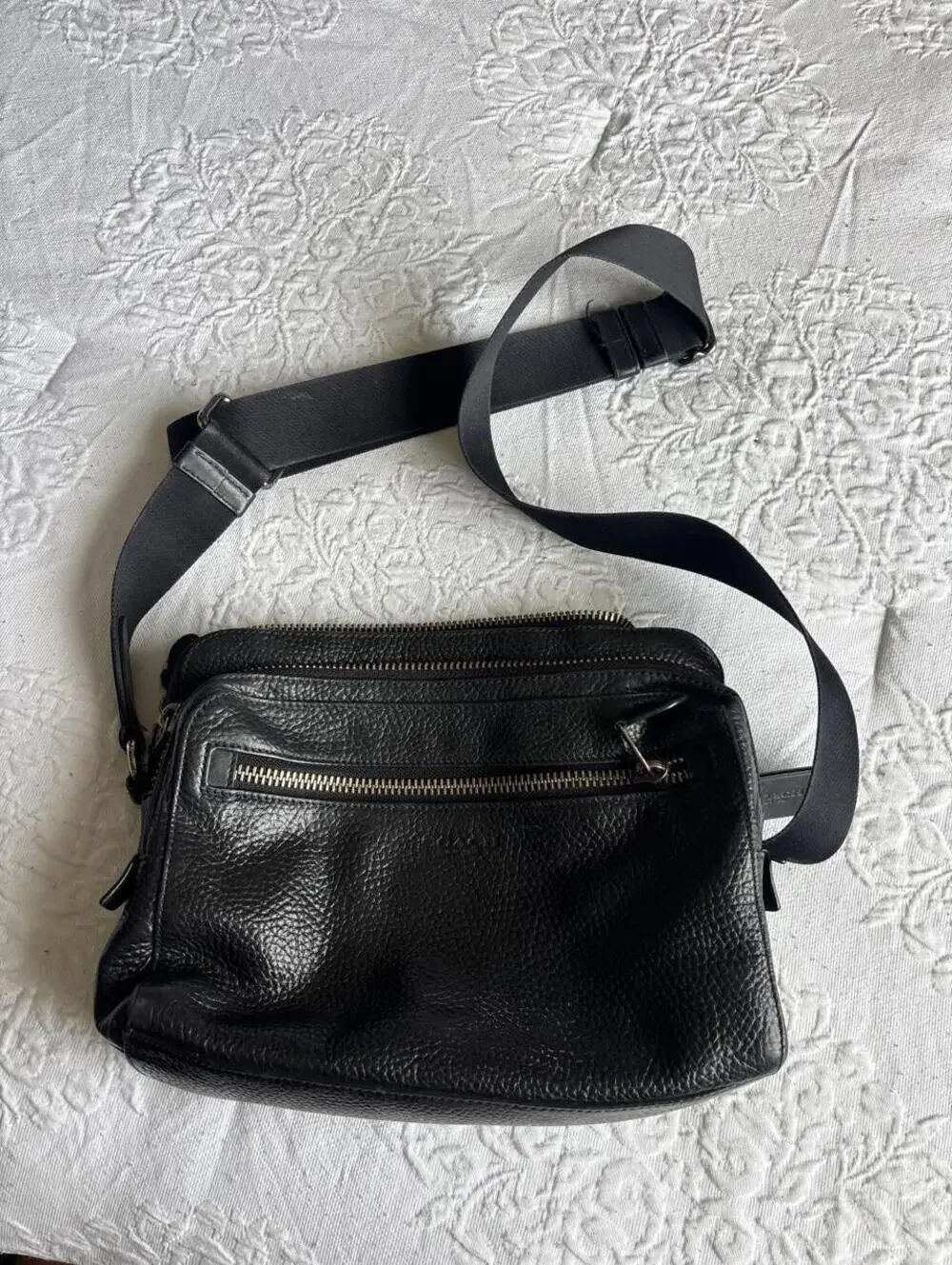 Contact Black pebbled leather crossbody bag